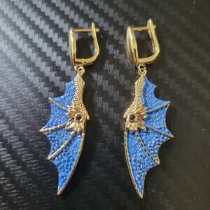 Gorgeous blue and gold tone detailed dragon wing earrings